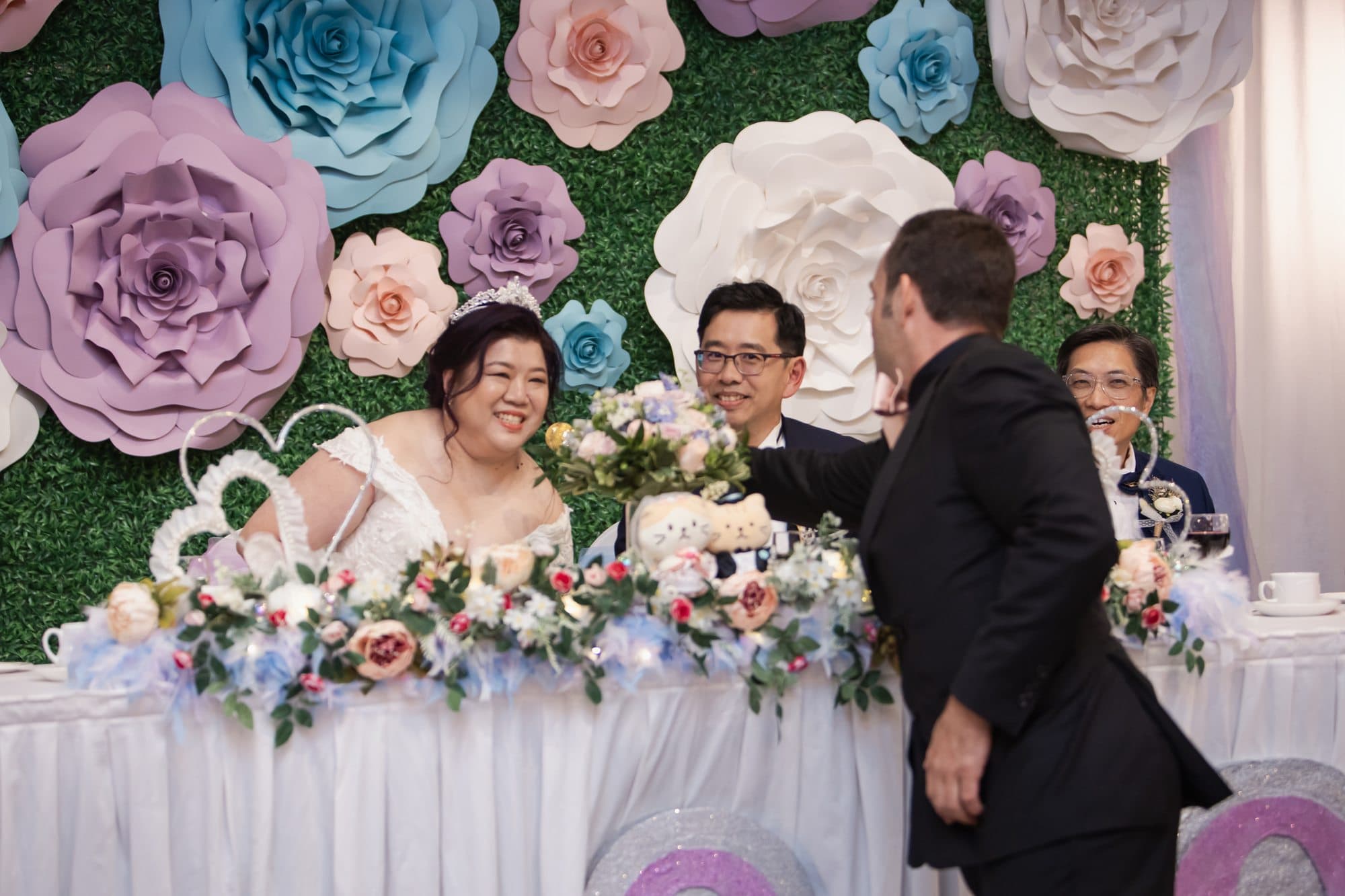 A wedding head table during the reception